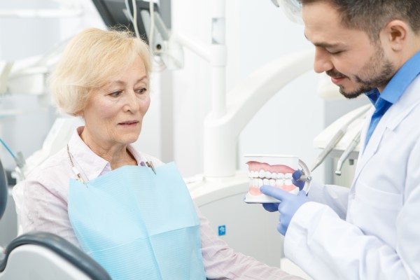 Comparing Implant Supported Dentures With Traditional Dentures